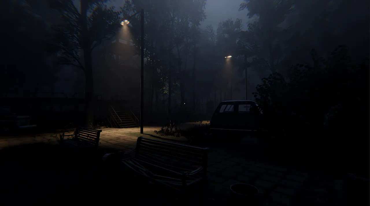 The courtyard and parking lot at night